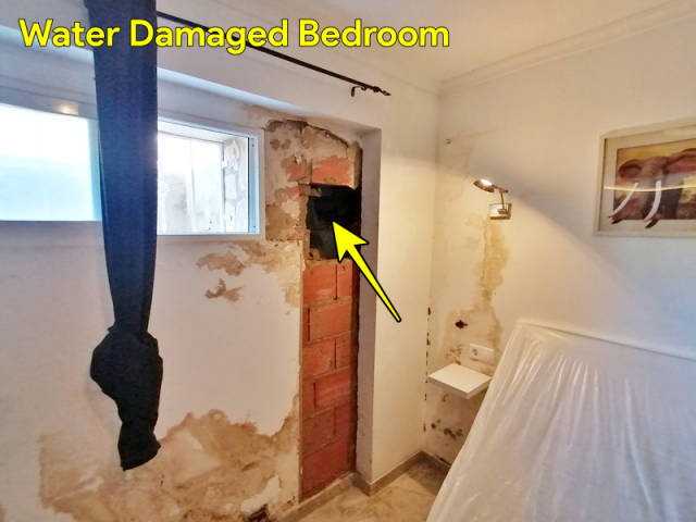 water damaged bedroom walls